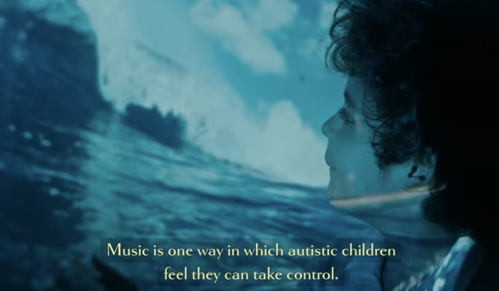 Still from In Pursuit of Wellness about music and autistic children