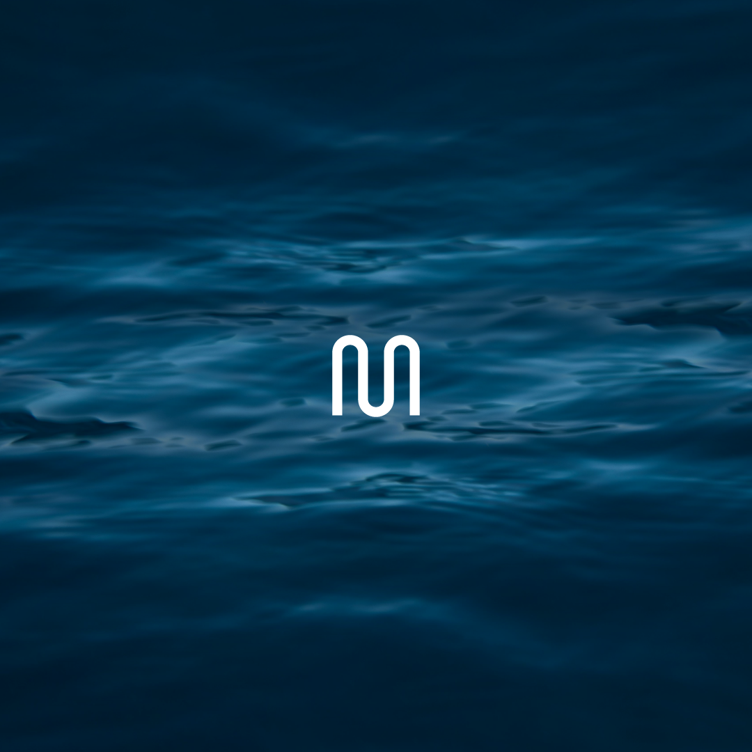 Destress with 528Hz playlist artwork, gentle ripples on deep blue water