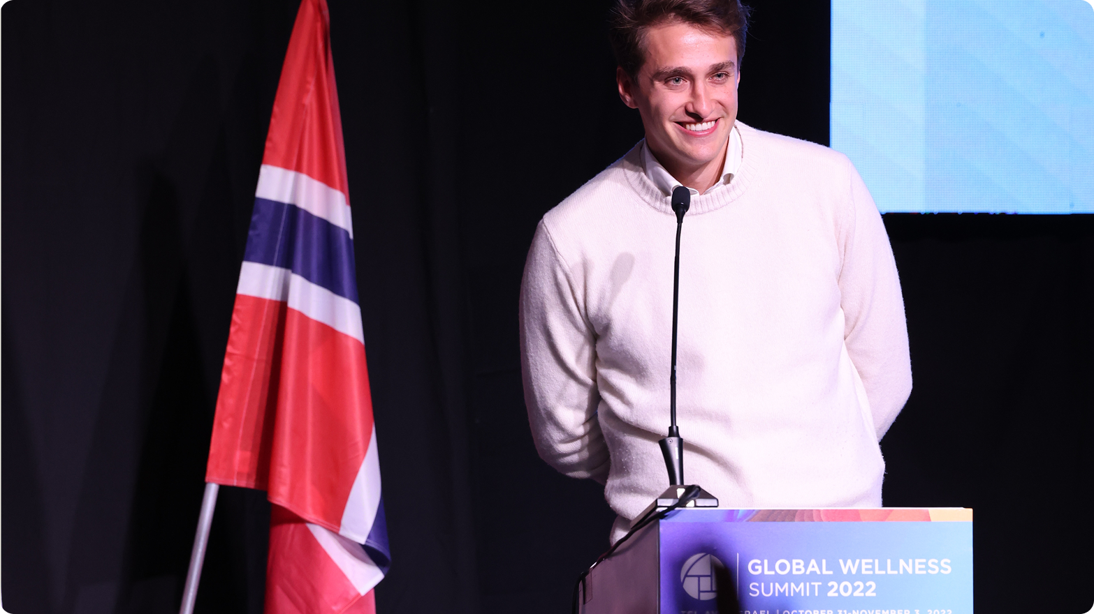 Speaker on stage at the Global Wellness Summit 2022