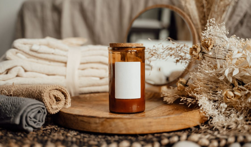 Spa still life with towels, a candle and dried flowers