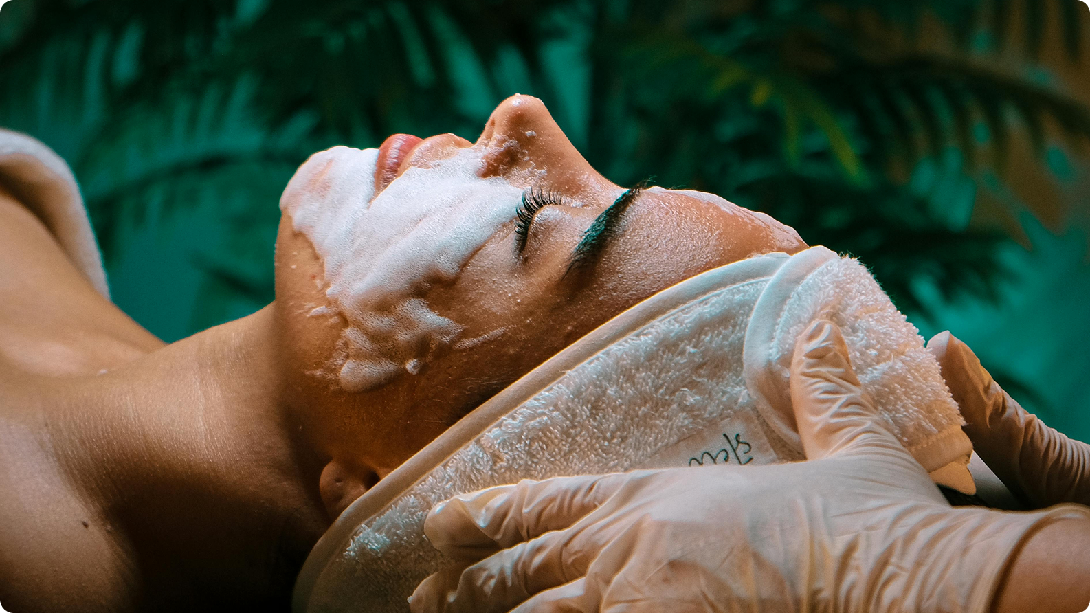 Client receiving a facial treatment at a day spa