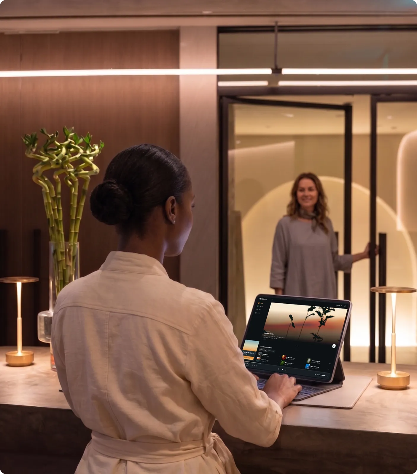 Guest being welcomed at a spa reception desk
